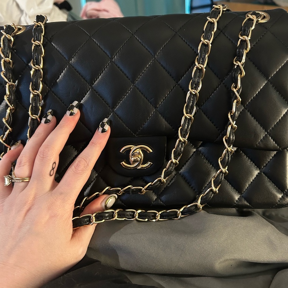 Chanel Black Quilted lambskin double flap Leather Bag